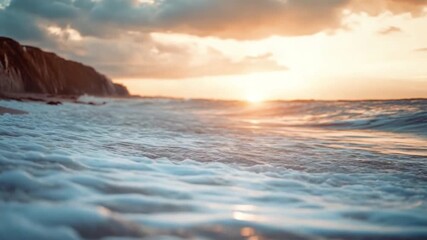 Wall Mural - this footage captures the tranquil ocean waves at sunset. each splash creates a peaceful atmosphere.