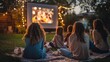 © Leonid - A group of friends enjoys an outdoor movie night in a cozy backyard. They sit on a blanket, watching a film on a projector screen, surrounded by warm string lights creating a magical atmosphere
