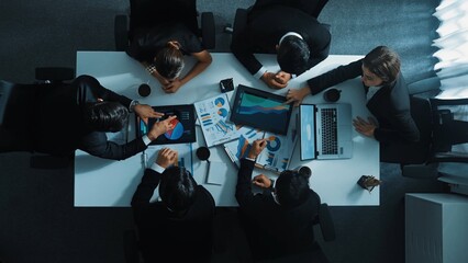 Poster - Top down aerial view of professional businessman handed out financial statistic to analyst data investment graph. Group of diverse investors brainstorming and planning marketing strategy. Directorate.