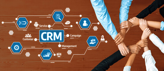 Poster - Hands coming together on a desk symbolize teamwork in customer relationship management, highlighting collaboration in business development and strategic planning. Amity