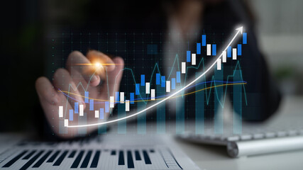 Poster - A business professional engages with a digital financial graph, showcasing stock market trends in a modern workspace, emphasizing data analysis and innovation. Impute