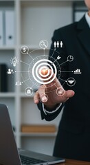 Poster - Business professional holding virtual target with strategy icons. Business success and goal achievement concept. Modern office with digital overlay elements.