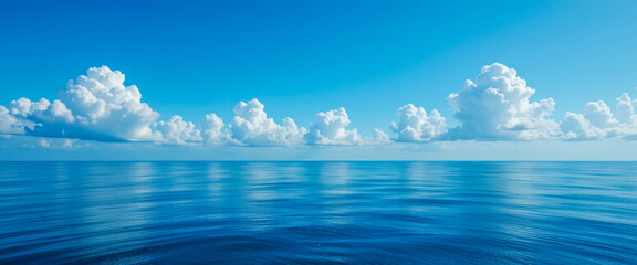 Wall Mural - ocean, sea, horizon, sky, clouds, cumulus, blue, water, calm, tranquil, peaceful, serene, summer, day, bright, sun, sunshine, light, atmosphere, nature, landscape, seascape, view, scene, beautiful, sc