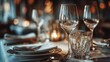 © Amelia - Close up elegant table setting with shallow depth of field wine glasses silverware upscale restaurant decor photography