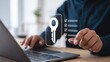 © Graphics_Bazaar - Securing online access with a digital key ensuring data privacy and protection while working on a modern laptop with a