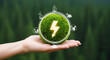 © Inspire Shots Hub - Green moss ball in hand, showcasing renewable energy sources like wind and solar, symbolizing sustainable energy and environmental conservation