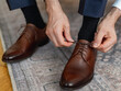 © majorosl66 - Man is lacing his shoe