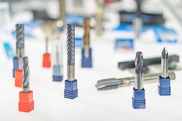 Poster - Two panels showcase a collection of screwdrivers, arranged differently and encased in grips The left panel has nine screwdrivers with light-colored background, varying sizes, and clear ridges The r