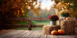 © Irina Sharnina - Autumn banner . Hay bales, pumpkins and iron buckets with chrysanthemums decorate a wooden porch against a blurred autumn background. Cozy fall backdrop  for for harvest theme, home decoration