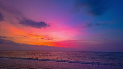 Wall Mural - Time lapse amazing sky at sunset.
Scene of Colorful romantic sky sunset with cloud in the sky background.
colorful clouds moving away rolling. 
4K video cloudscape.