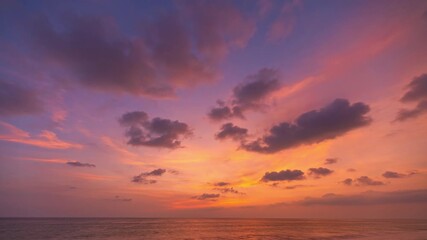 Wall Mural - Time lapse amazing sky at sunset.
Scene of Colorful romantic sky sunset with cloud in the sky background.
colorful clouds moving away rolling. 
4K video cloudscape.