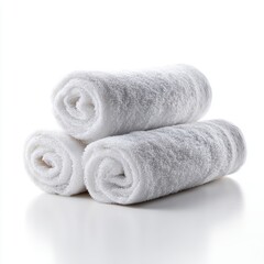 Poster - A set of plain white hand towels, rolled, isolated on a pure white background. Bathroom, hospitality.