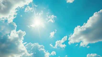 Wall Mural - A sunny day with bright rays of sunlight shining through puffy white clouds