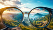 © Sim - Glasses with a view of a mountain range and a cityscape, reflecting the surrounding landscape.