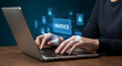 © SnapSpark Studios - Invoice processing automation concept person typing on laptop with digital financial interface for efficient billing and accounting management streamlined business operations