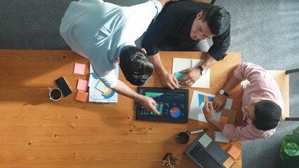Poster - Top aerial view of diverse business team talking and brainstorming marketing idea while colleague walking and joining meeting. Professional people solving problem and looking at report. Convocation.
