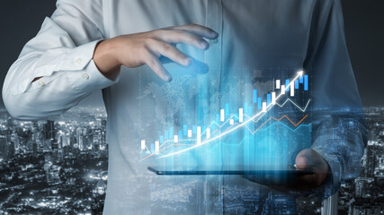 Poster - A businessman uses a digital tablet to display a financial growth graph, symbolizing success and innovation in a vibrant city at night. Impute