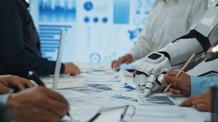 Poster - A dynamic scene depicting collaboration between humans and a robot in a modern office, focusing on data analysis and strategic planning for business success.Noogenesis