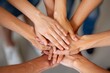 © Prism Hue - Teamwork hands together collaboration unity success business partnership support group