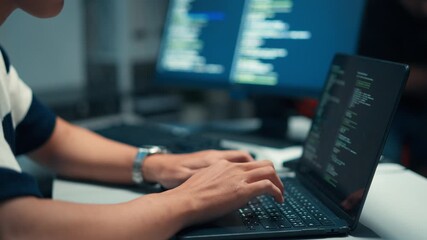 Hands coding secure software focusing on backend logic, cybersecurity, and system development.