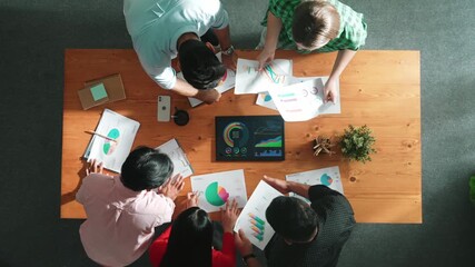 Poster - Top view of business people brainstorming and planning strategy by using financial graph or data analysis. Top down aerial view of team working together to analyze stock market graph. Convocation.