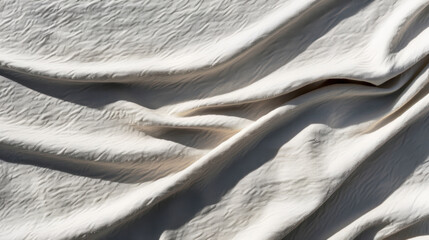 Poster - Soft white linen fabric draped elegantly, showcasing minimal texture with gentle waves and folds. light creates serene atmosphere, enhancing fabric delicate appearance