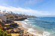 © sherryvsmith - Homes along the coastline with steps leading down to the beach in La Jolla, California.