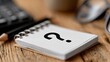 © MiguelAngel - Question mark written on notepad lying on wooden table