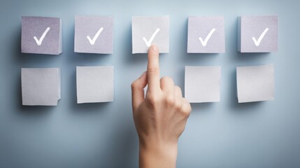 Poster - Hand pointing at a set of paper squares as a representation of innovation culture score and creative idea indicators