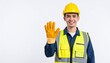 © photostockatinat - A construction worker confidently displaying his gloved hand in a greeting gesture, wearing a safety vest and helmet and smiling friendly