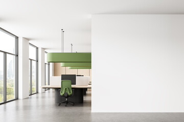 Poster - Modern office interior with green accents and a large blank white wall for poster or billboard mockup presentation template in clean layout style. 3D Rendering