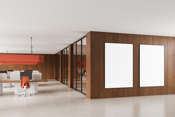 Poster - Modern office interior with two large blank posters on wooden wall in clean corporate environment mockup template for design presentation concept. 3D Rendering