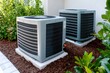 © inas - Modern residential HVAC units installed outdoors for heating and cooling system efficiency