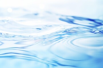 Poster - Refreshing water surface with gentle ripples and concentric circles creating a calming and pure blue background