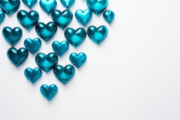 Poster - Teal blue hearts forming a border on white background with copy space, creating a romantic and lovely atmosphere