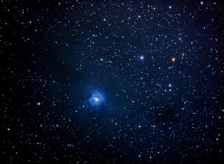 Wall Mural - a colorful blue nebula in deep space