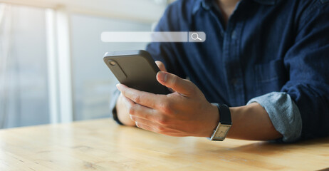 Sticker - close up young asian man hold smartphone and using url to search about seo (search engine optimisati