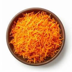 Poster - Grated carrots are lying in a brown bowl, shot on white background from a bird's eye view