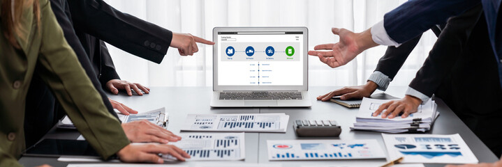 Poster - Panorama shot analyst team utilizing BI Fintech to analyze financial report with laptop. Businesspeople analyzing BI data dashboard displayed on laptop screen for business insight. Prodigy