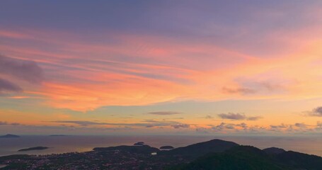 Wall Mural - aerial view stunning sunrise above archipelago Phuket. beautiful moving cloud in vivid sky at sunrise. 4k stock footage video in travel concept. amazing colorful clouds over the horizon