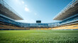 © Ada - Grass football pitch at stadium at sunny day with blue sky. large, modern, and empty sports stadium. The vibrant green grass field is in the foreground, leading up to rows of blue and yellow seats