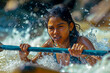 © Diversity - With unwavering resolve, an Indian girl faces each rapid with determination and courage, her paddling skills matched only by her fearless spirit.
