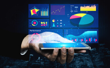 Poster - A hand holds a tablet displaying vibrant digital data visualizations and performance metrics, symbolizing technology and business analytics. Impute