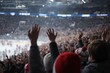 © Iftikhar alam - Excitement fills the arena as fans cheer passionately during an intense hockey match in a packed stadium at night