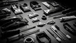 © Flex - Black and white top-down photo of disassembled barber clippers, tools, screws, oil tubes, and brushes laid out on a dark surface for cleaning, repair, and maintenance of grooming equipment
