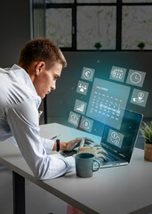 Poster - Business professional using laptop in modern office with digital interface displaying productivity tools in the afternoon