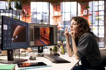 Poster - Woman works with AI generated app to develop a futuristic spaceship station. Neural network powered software uses automation and machine learning to generate realistic game environments.