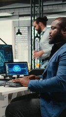Poster - Vertical Video Black man IT expert handles neural networks systems for data forecasting, combining AI automation tools with digitalization to drive multinational company efficiency and innovation