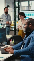 Poster - Vertical Video Black engineer uses artificial intelligence systems for automation and data mining, employing neural networks for innovation and digitalization. Multinational company functions with AI