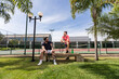 © NPix - Tennis Players Resting and Talking by Court – Sports and Friendship
